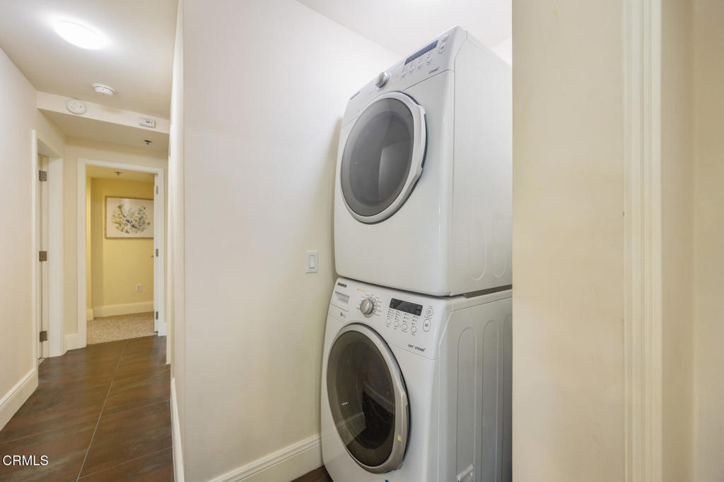 120 South Mentor Avenue, Unit 202 Pasadena, CA 91106 - Photo 34 of 40 a view of a hallway with washer and dryer