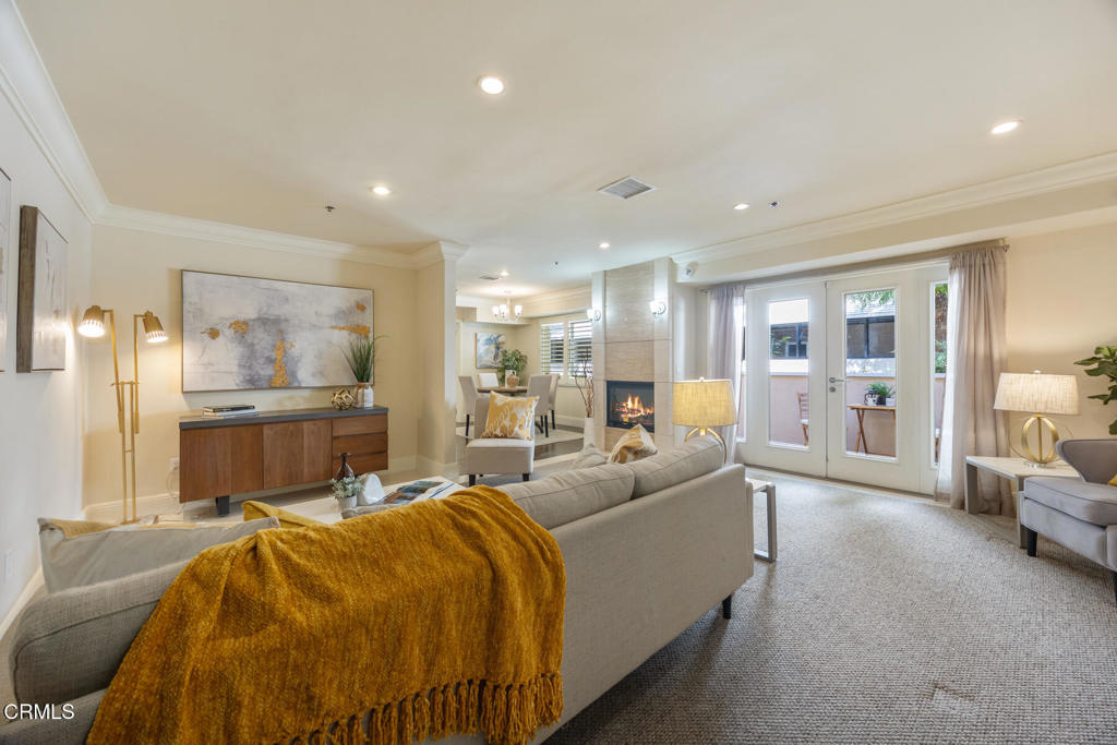 120 South Mentor Avenue, Unit 202 Pasadena, CA 91106 - Photo 4 of 40 a living room with a couch and furniture