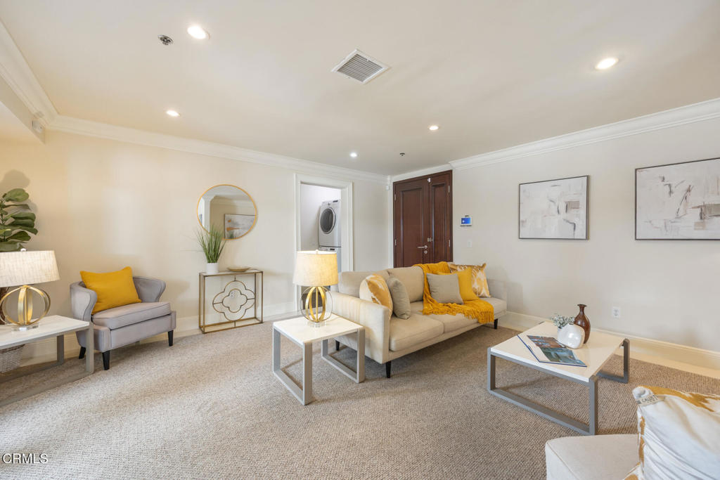 120 South Mentor Avenue, Unit 202 Pasadena, CA 91106 - Photo 6 of 40 a living room with furniture
