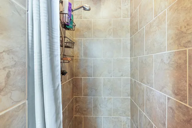 a view of a porch with wooden floor