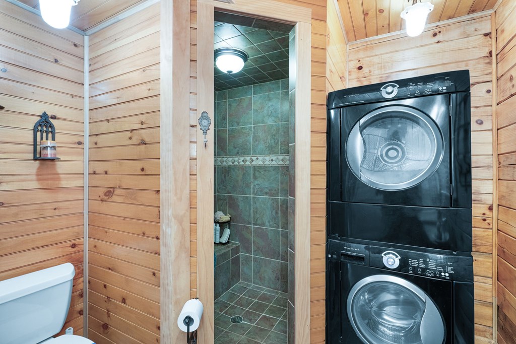 488 Smith Road Brasstown, NC 28902 - Photo 19 of 42 a bathroom with a toilet and a shower