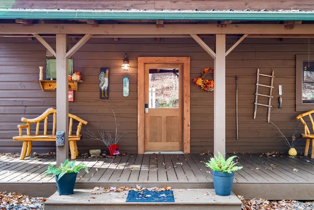 a view of a backyard of the house
