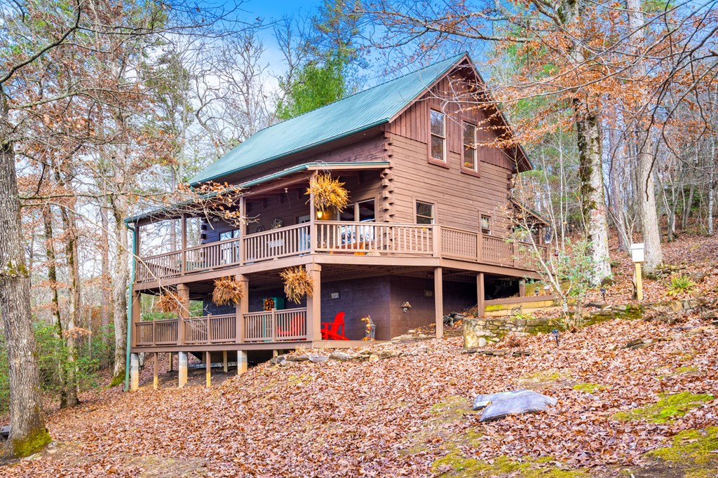 488 Smith Road Brasstown, NC 28902 - Photo 34 of 42 a front view of a house with garage