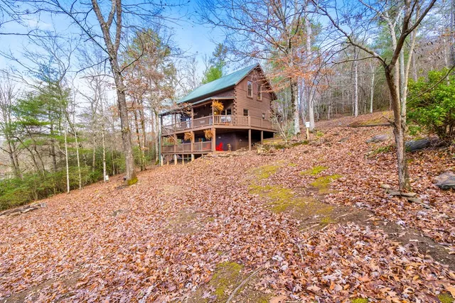 a view of a chairs and table in the patio