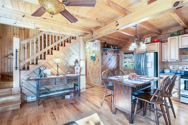 a view of a chairs and table in a patio