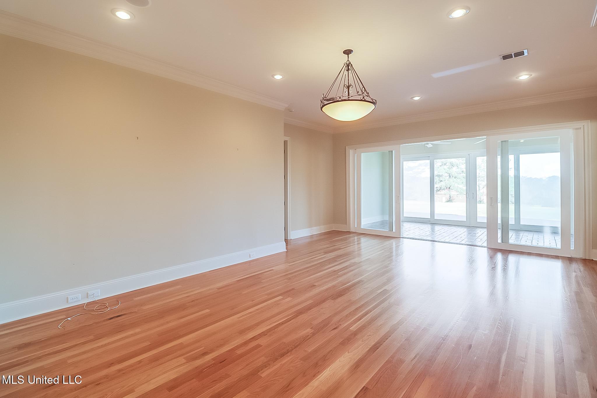 19910 Red Oak Road Saucier, MS 39574 - Photo 15 of 78 Formal living and sunroom