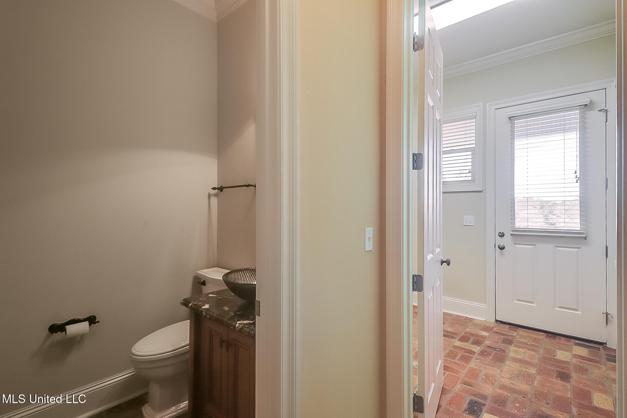 19910 Red Oak Road Saucier, MS 39574 - Photo 35 of 78 First floor half bath, laundry