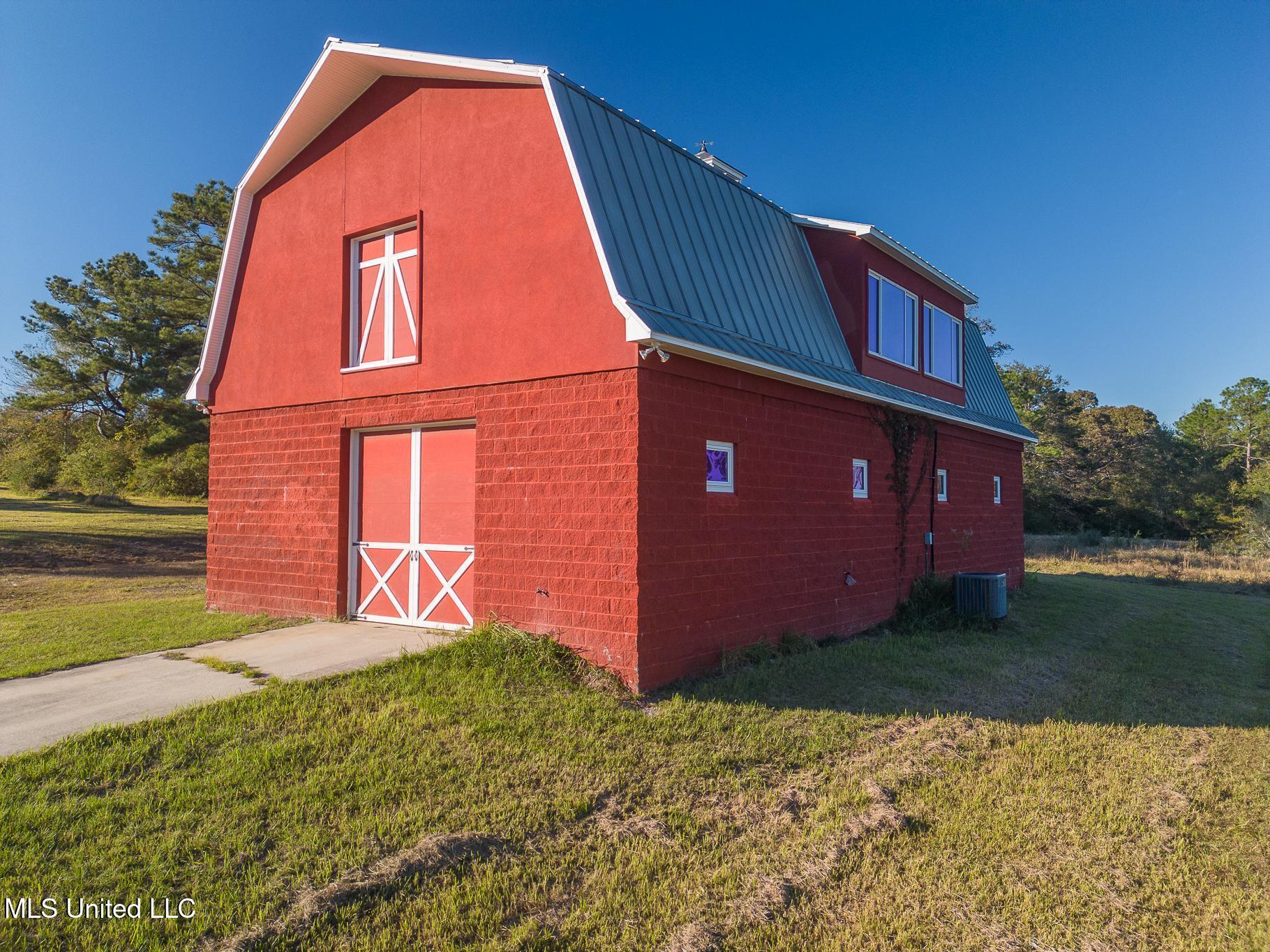19910 Red Oak Road Saucier, MS 39574 - Photo 54 of 78 "Barn" workshop 2/apartment