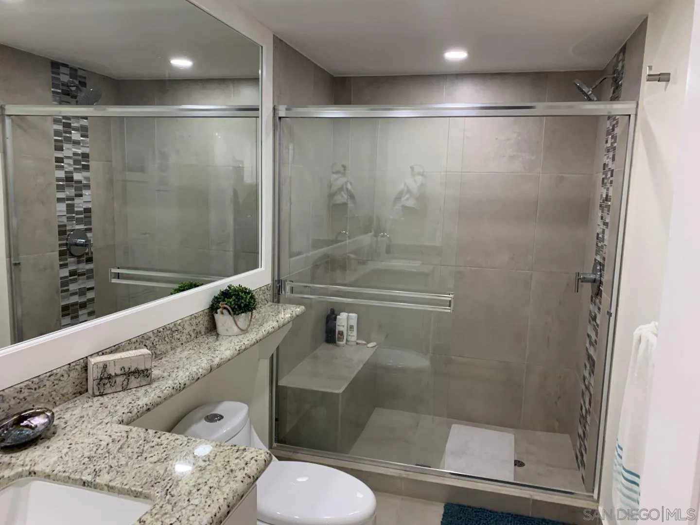 115 Carretera Libre Tijuana O'Neals, CA 93645 - Photo 24 of 62 a bathroom with a granite countertop sink toilet and shower