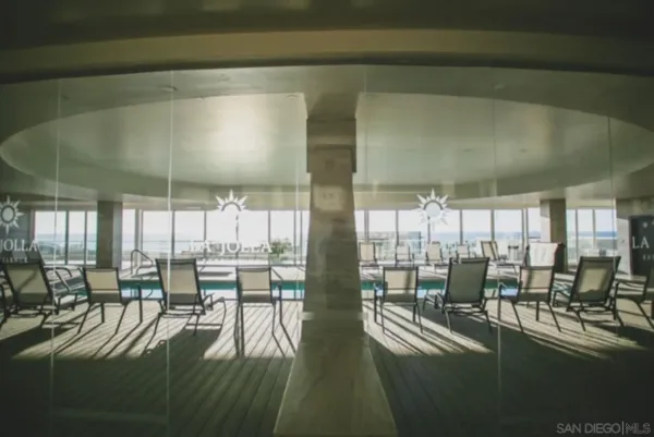 a view of a balcony with an ocean view