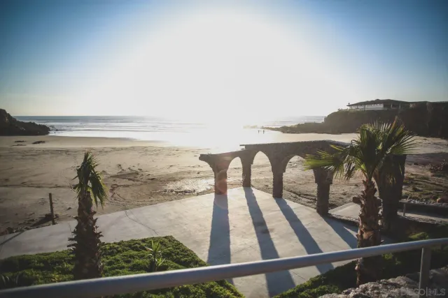 a living room with furniture wooden floor and a flat screen tv