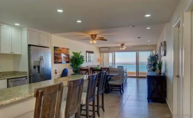 a view of living room with furniture and flat screen tv