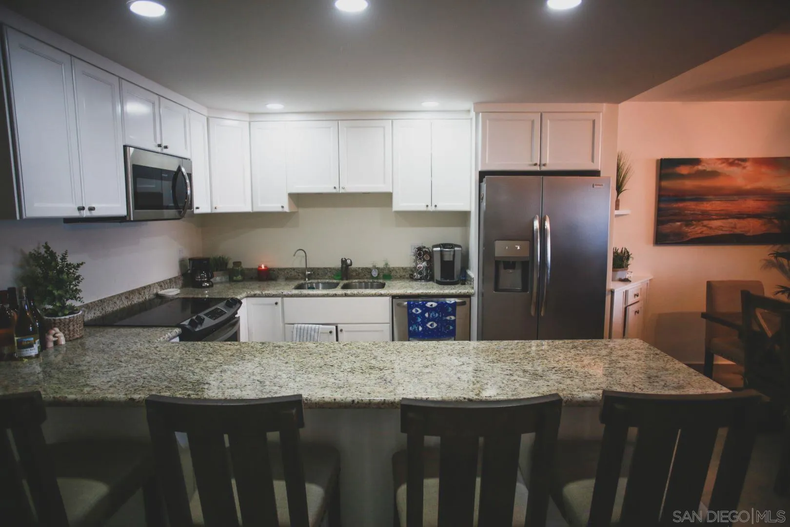 115 Carretera Libre Tijuana O'Neals, CA 93645 - Photo 50 of 62 a kitchen with granite countertop a refrigerator a stove a sink a stove and dishwasher
