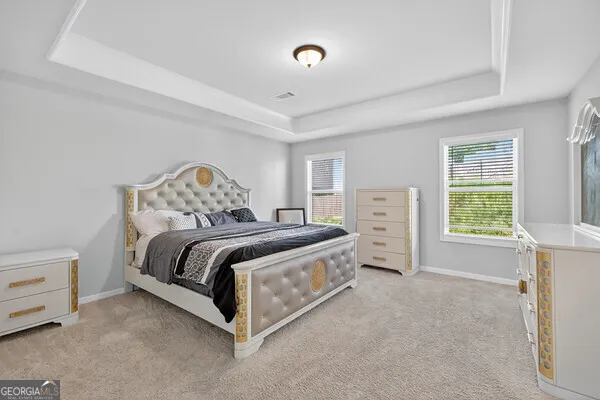 a bathroom with a sink vanity and mirror