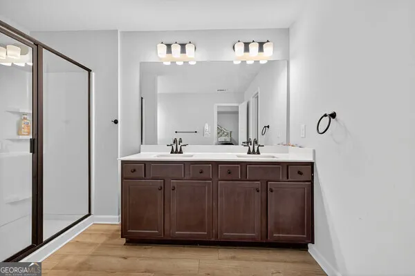 a bathroom with a bathtub and a sink