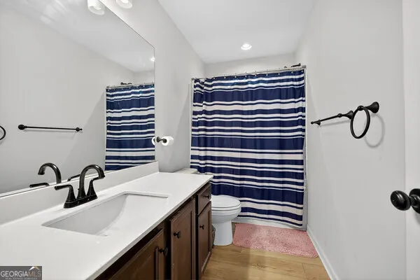 a view of storage and utility room with washer and dryer