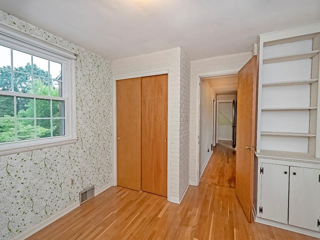 1587 Anderson Road Pittsburgh, PA 15209 - Photo 15 of 22 a view of a hallway with wooden floor and entryway