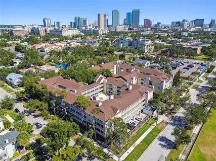 an aerial view of a city with lots of residential buildings