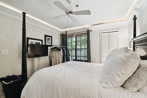 an aerial view of a house with a swimming pool yard and outdoor seating