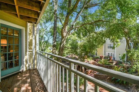 a swimming pool with outdoor seating and yard