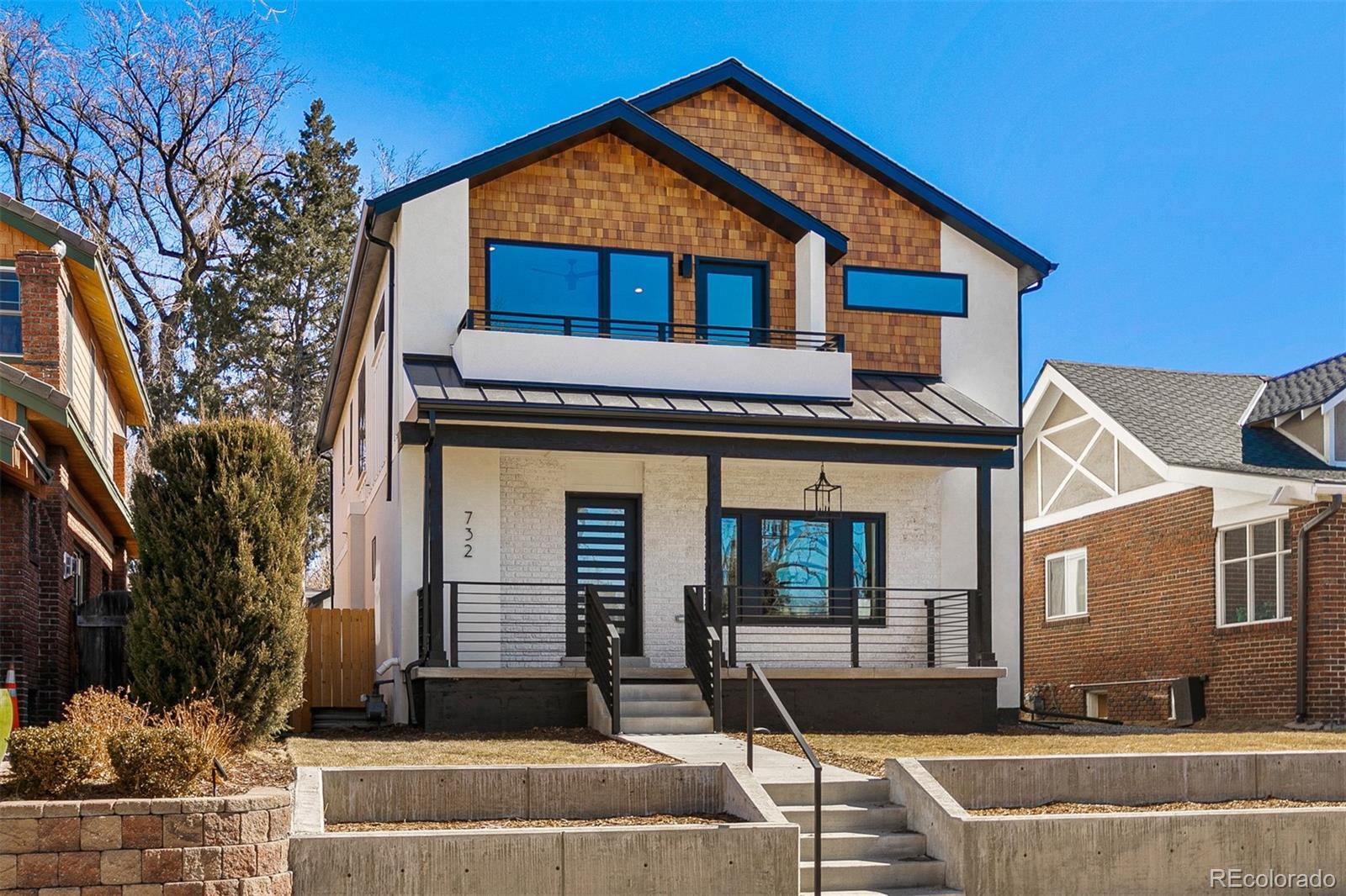732 South Gilpin Street Denver, CO 80209 - Photo 1 of 40 a front view of a house with garden
