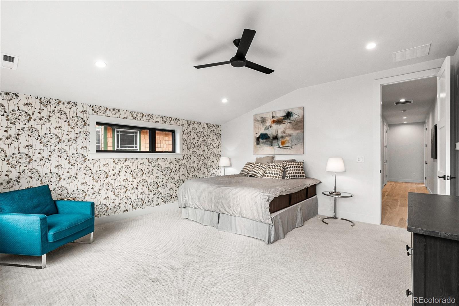 732 South Gilpin Street Denver, CO 80209 - Photo 24 of 40 a spacious bedroom with a bed and a couch
