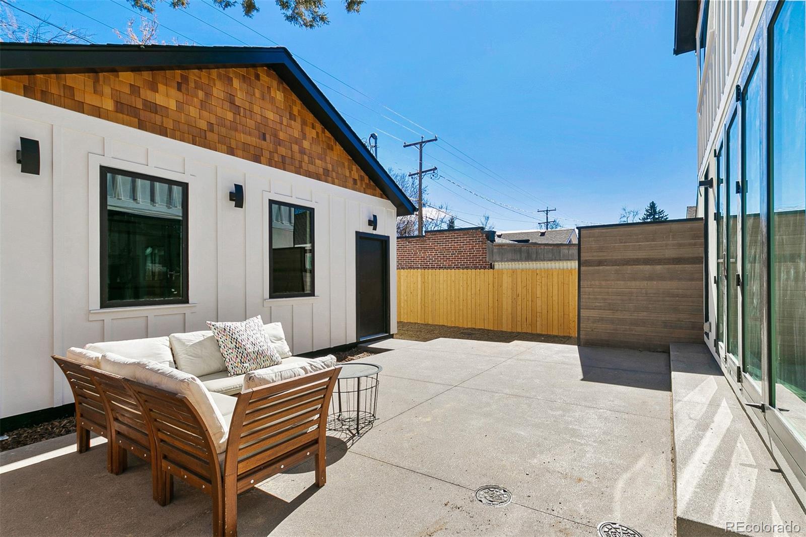 732 South Gilpin Street Denver, CO 80209 - Photo 39 of 40 a balcony with furniture and a potted plant