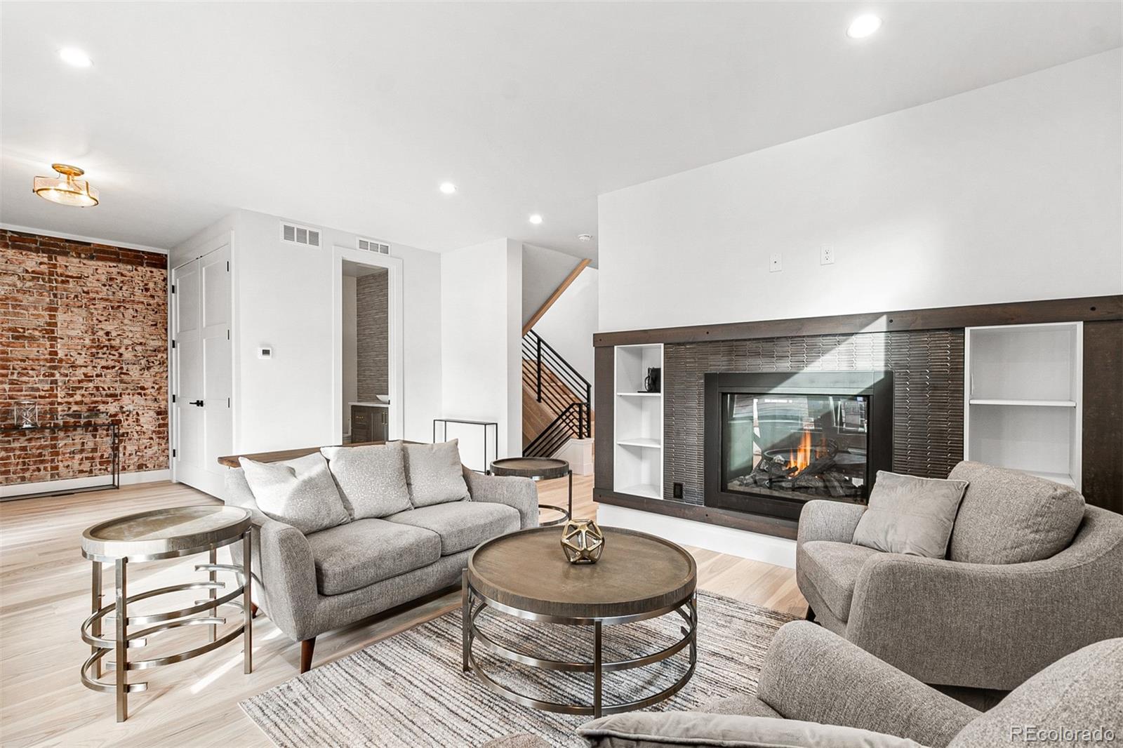 732 South Gilpin Street Denver, CO 80209 - Photo 5 of 40 a living room with furniture and a large window
