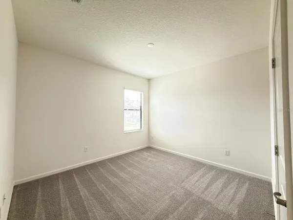 $7,999 | 1323 Butterfly Orchid Road, Davenport, FL 33837