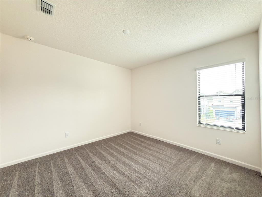 1323 Butterfly Orchid Road Davenport, FL 33837 - Photo 18 of 57