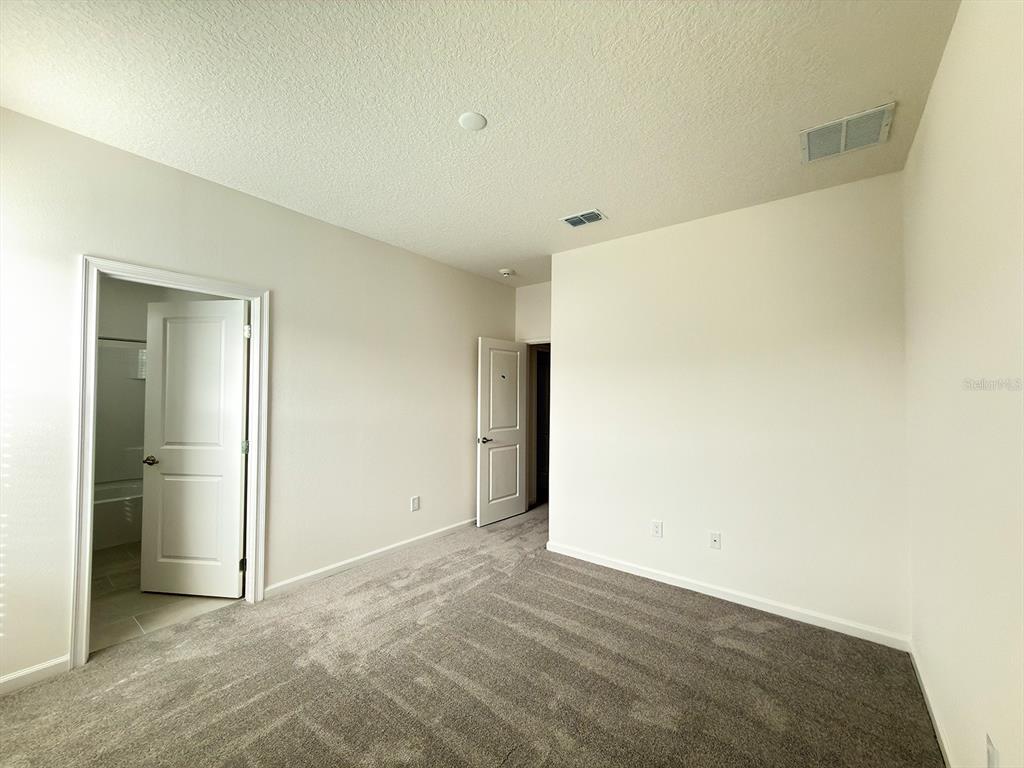 1323 Butterfly Orchid Road Davenport, FL 33837 - Photo 19 of 57