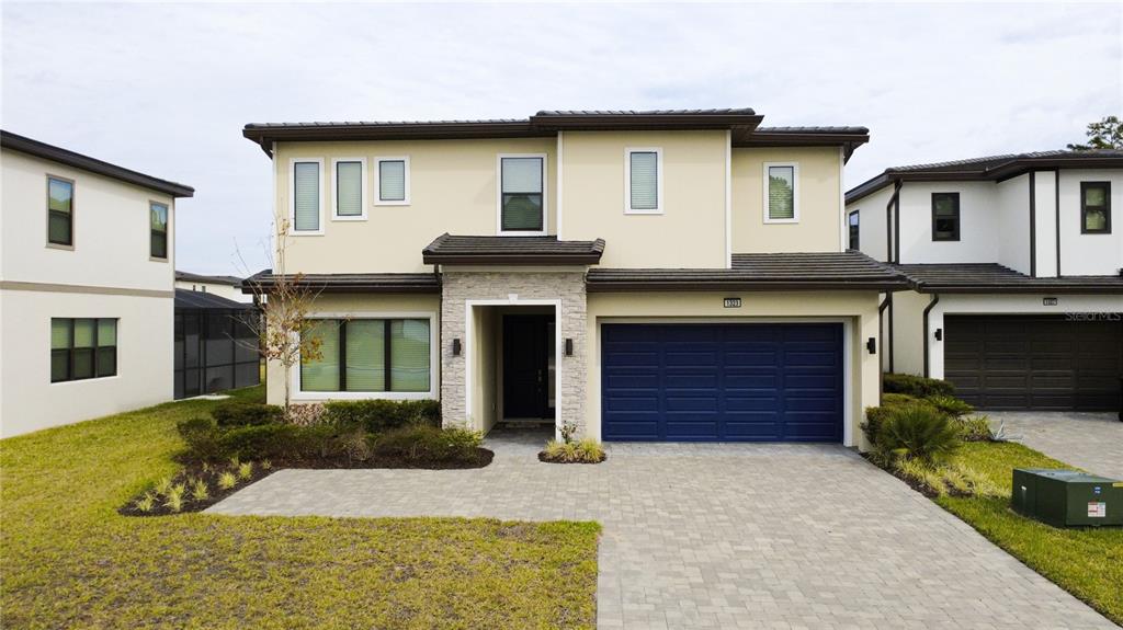 1323 Butterfly Orchid Road Davenport, FL 33837 - Photo 2 of 57