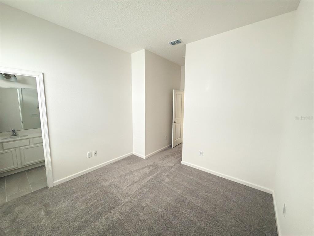 1323 Butterfly Orchid Road Davenport, FL 33837 - Photo 26 of 57