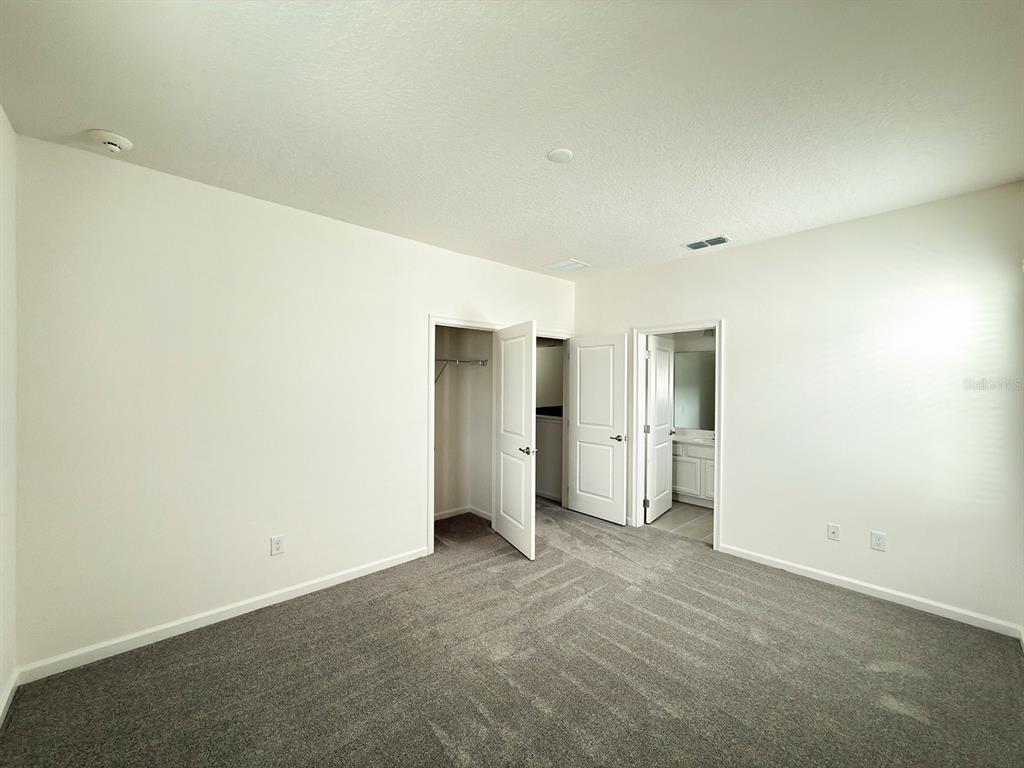 1323 Butterfly Orchid Road Davenport, FL 33837 - Photo 28 of 57