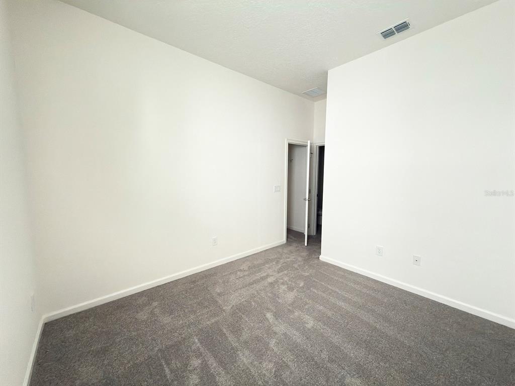 1323 Butterfly Orchid Road Davenport, FL 33837 - Photo 31 of 57