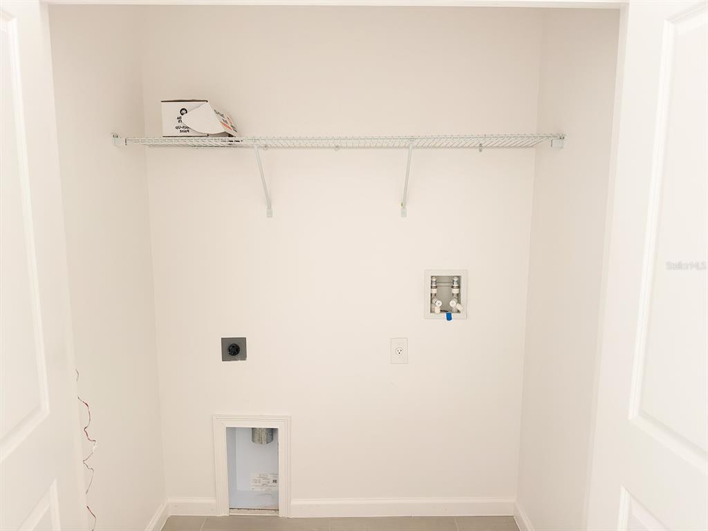 1323 Butterfly Orchid Road Davenport, FL 33837 - Photo 6 of 57