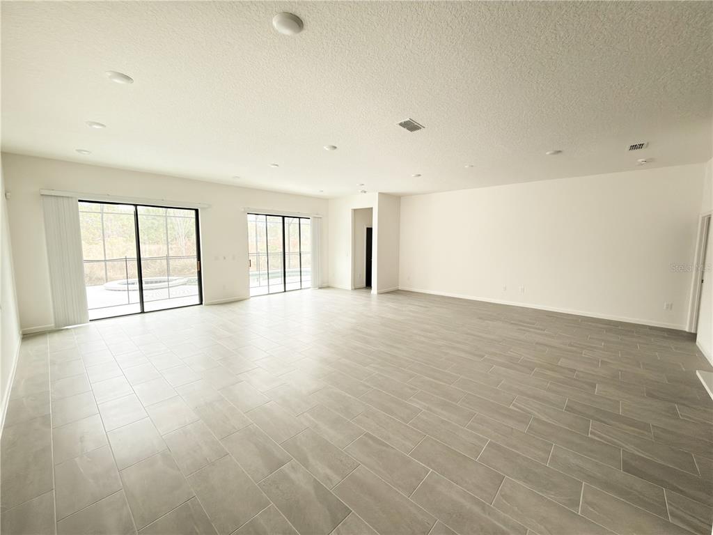 1323 Butterfly Orchid Road Davenport, FL 33837 - Photo 10 of 57