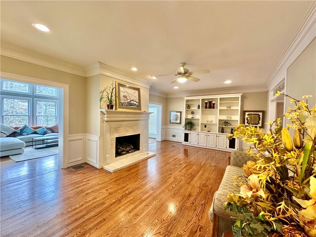 3510 Greystone Circle Atlanta, GA 30341 - Photo 13 of 29 a view of a livingroom with furniture a fireplace and wooden floor