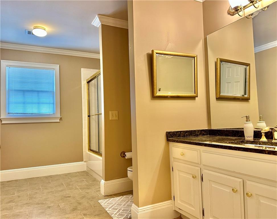 3510 Greystone Circle Atlanta, GA 30341 - Photo 19 of 29 a bathroom with a sink and a mirror