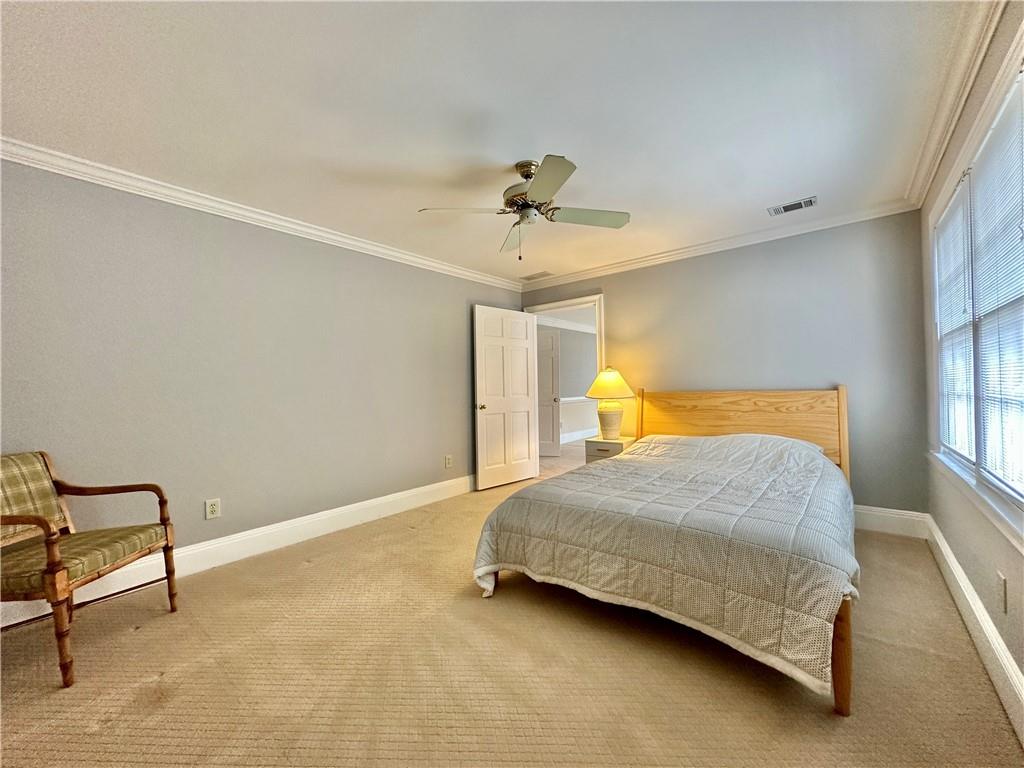 3510 Greystone Circle Atlanta, GA 30341 - Photo 23 of 29 a bedroom with a bed and window