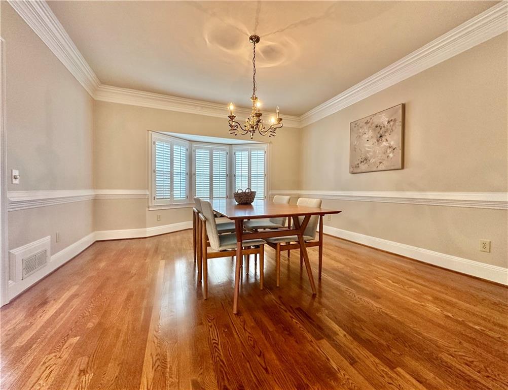 3510 Greystone Circle Atlanta, GA 30341 - Photo 6 of 29 a view of a dining room with furniture window and wooden floor