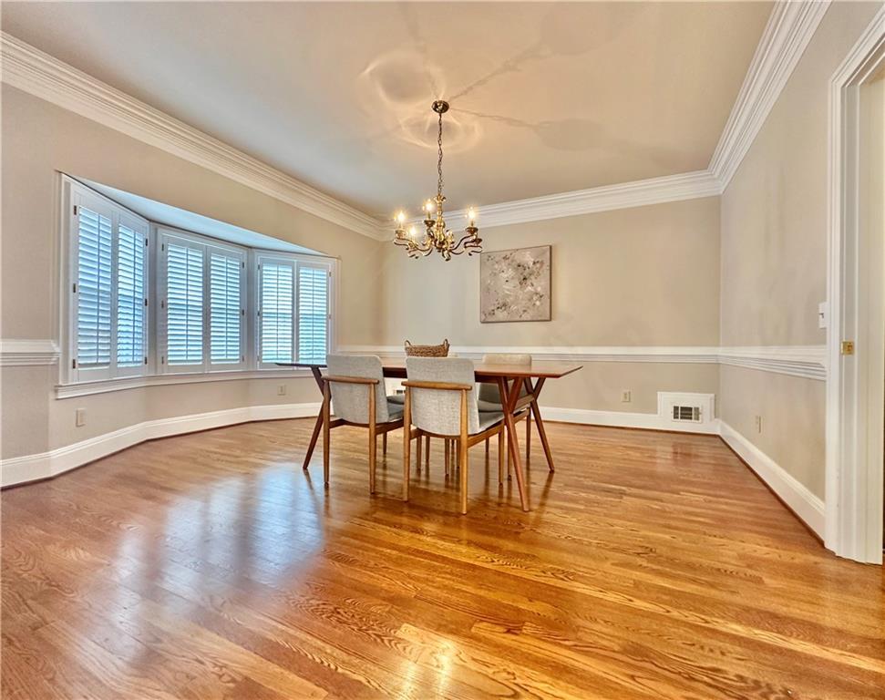 3510 Greystone Circle Atlanta, GA 30341 - Photo 7 of 29 a view of a dining room with furniture window and wooden floor