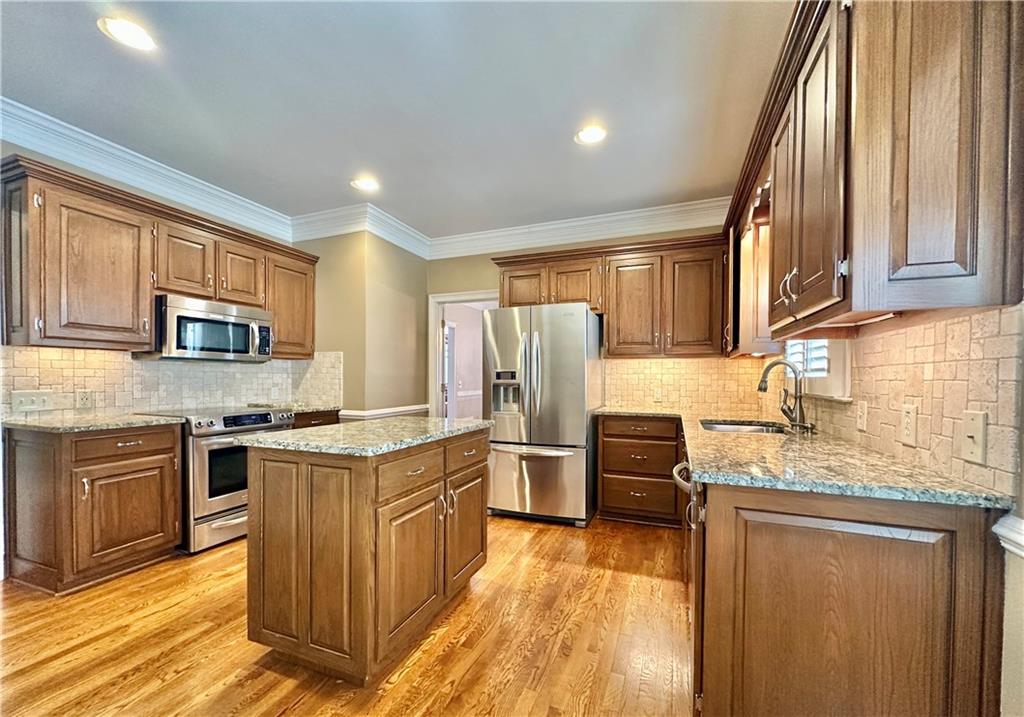 3510 Greystone Circle Atlanta, GA 30341 - Photo 8 of 29 a kitchen with stainless steel appliances granite countertop a stove top oven a refrigerator a sink and dishwasher