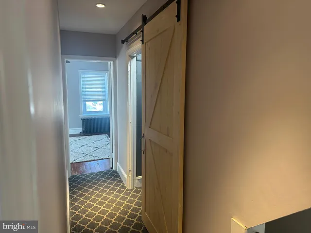 a bathroom with a shower and a toilet