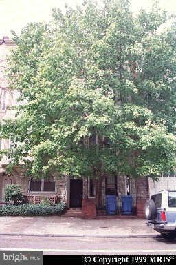 138 6th Street Northeast Washington, DC 20002 - Photo 1 of 1 a front view of a house with a garden