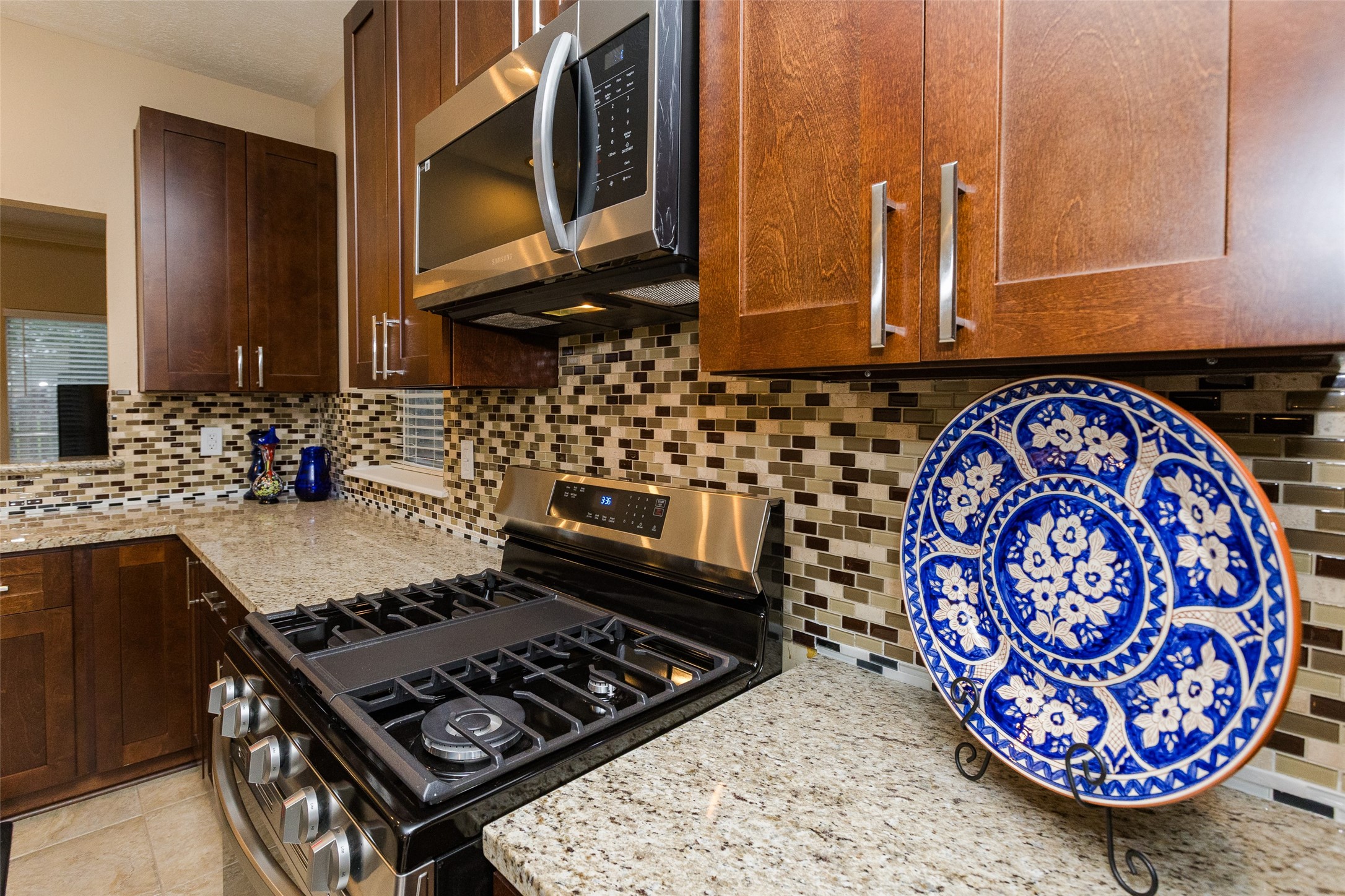 14602 Liscomb Drive Houston, TX 77084 - Photo 6 of 48 Recently purchased gas range. All cooks will love this kitchen.