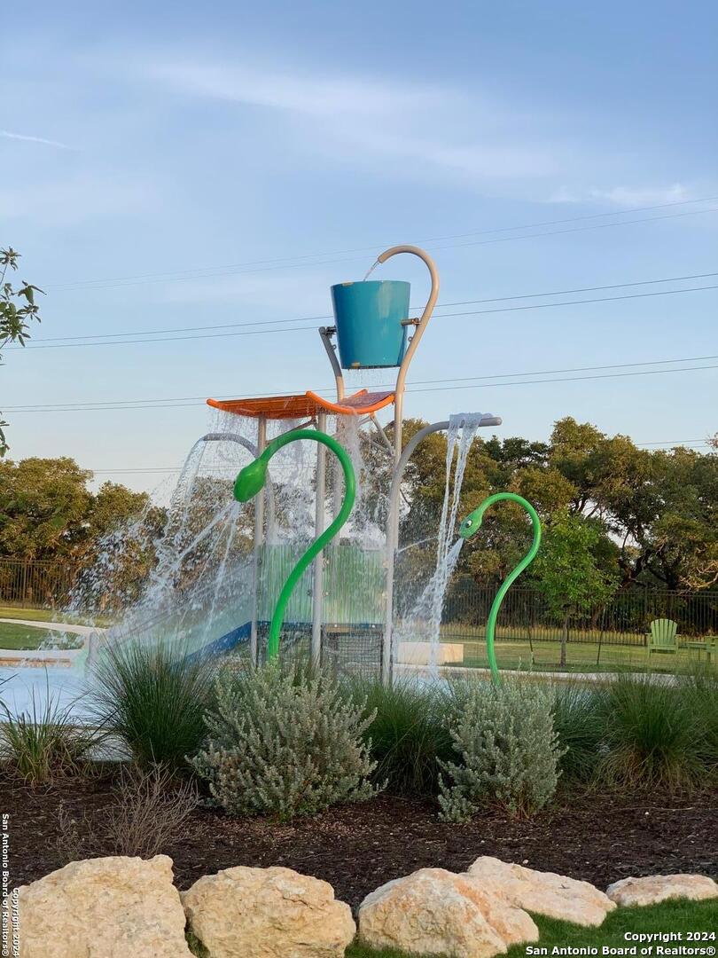 116 Escondido Boerne, TX 78006 - Photo 14 of 16 a view of a swimming pool with a yard