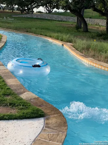 a view of a golf course with a yard