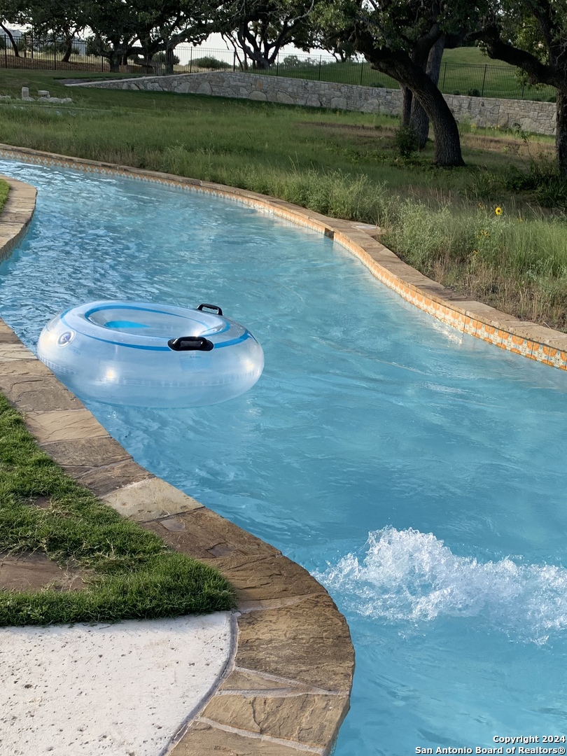 116 Escondido Boerne, TX 78006 - Photo 15 of 16 a view of a golf course with a yard