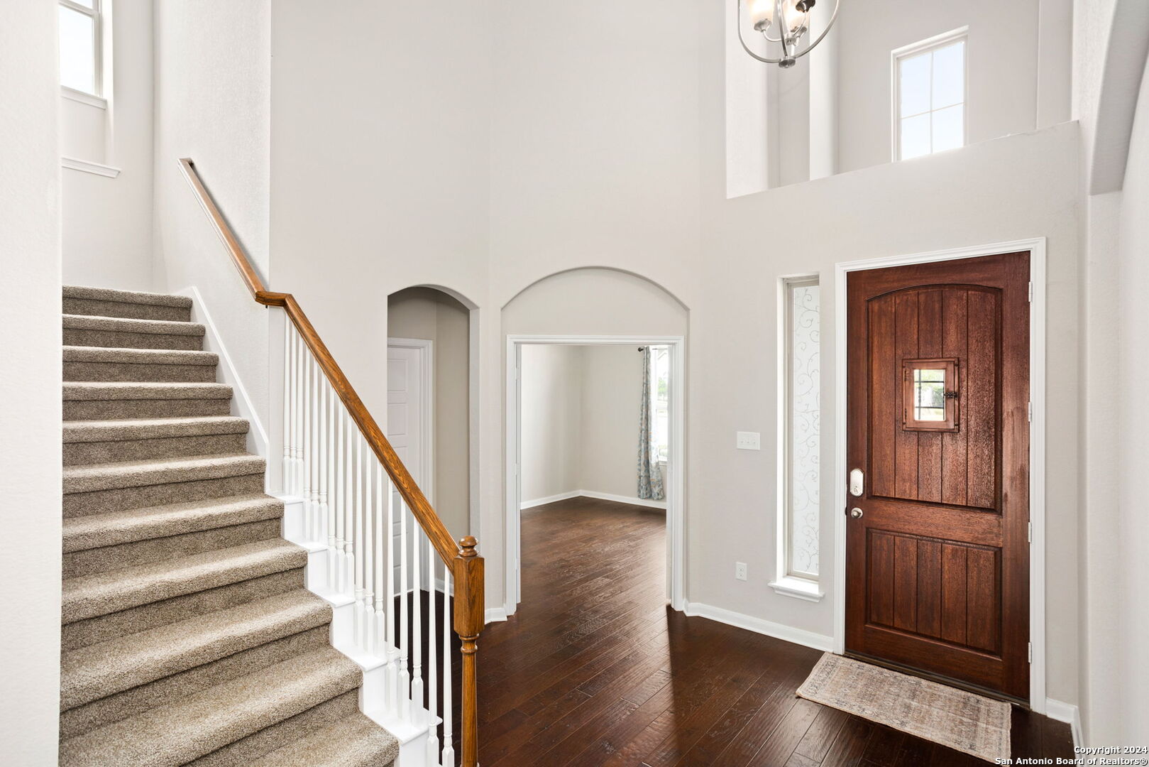 116 Escondido Boerne, TX 78006 - Photo 3 of 16 a view of entryway with wooden floor and stairs